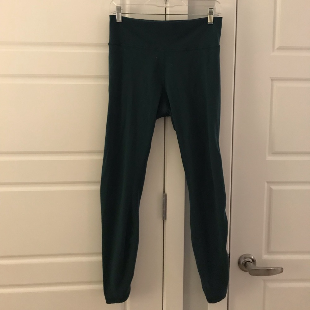 Green Lululemon leggings with lace up details